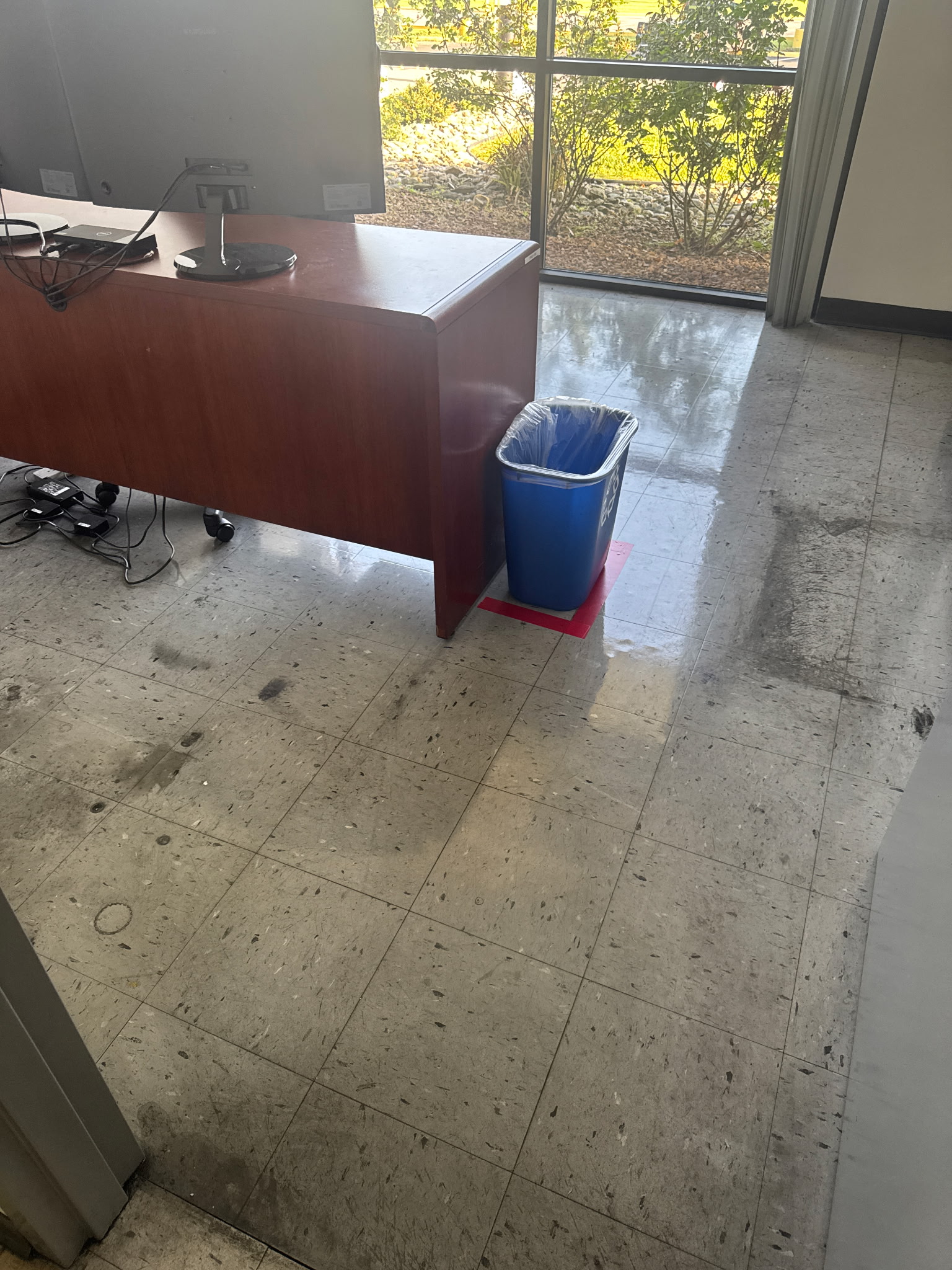 Commercial tile floor before JRae stripping and waxing service